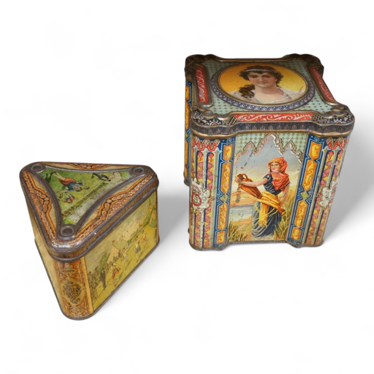 A Windmill biscuit tin by Huntley & Palmer: Reading & London, 'BIVM' Eastern Beauties tea tin and Huntley & Palmers triangular biscuit tin with 'Sports' motifs